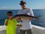 The White and Yellow shirts are popular choices for fishermen on our charter fishing trips on the Intimidator